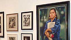 A gallery patron enjoys the exhibition