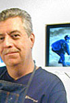 Mark Vallen at his easel. Photo by Jeannine Thorpe 